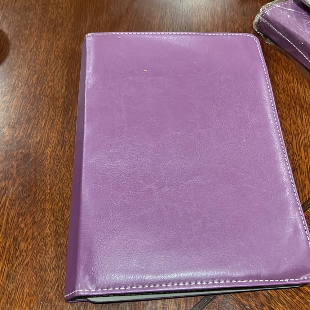 10in tablet case. Swivels. Color purple 3 available.